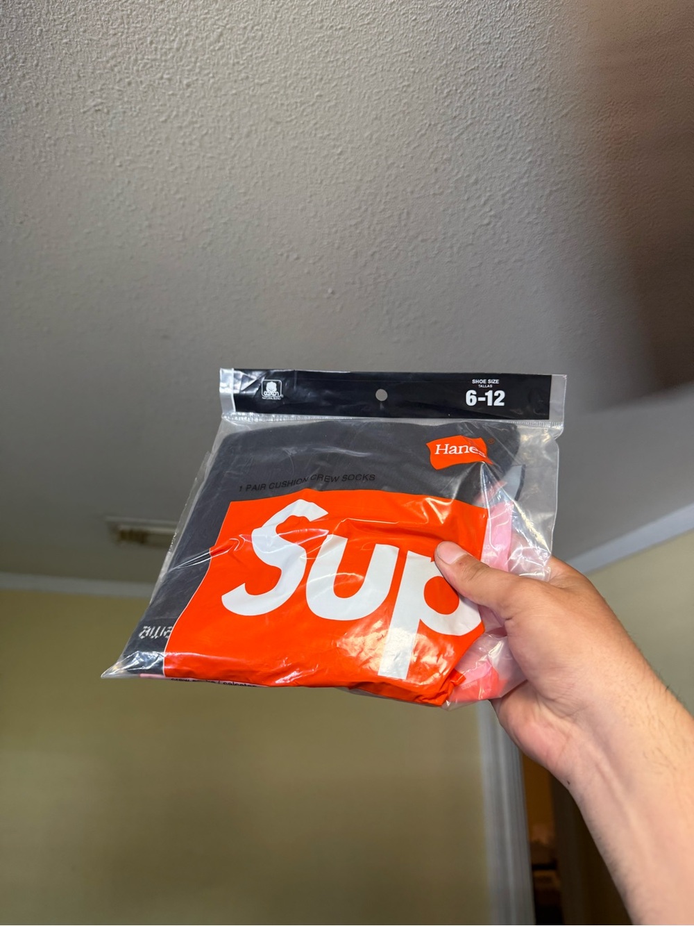 Hanes Black Crew Socks with Bold Orange Branding